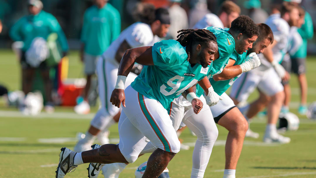 Jul 29, 2025; Miami Gardens, FL, USA; Miami Dolphins defensive tackle Jordan Phillips (94) runs on the field during training camp at Baptist Health Training Complex. Mandatory Credit: Sam Navarro-Imagn Images Jul 29, 2025; Miami Gardens, FL, USA; Miami Dolphins defensive tackle Jordan Phillips (94) runs on the field during training camp at Baptist Health Training Complex. Mandatory Credit: Sam Navarro-Imagn Images