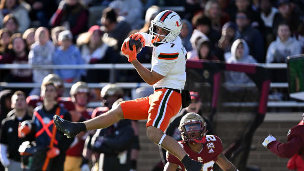 Miami Hurricanes wide receiver Xavier Restrepo catches a pass during a college football game in the ACC.