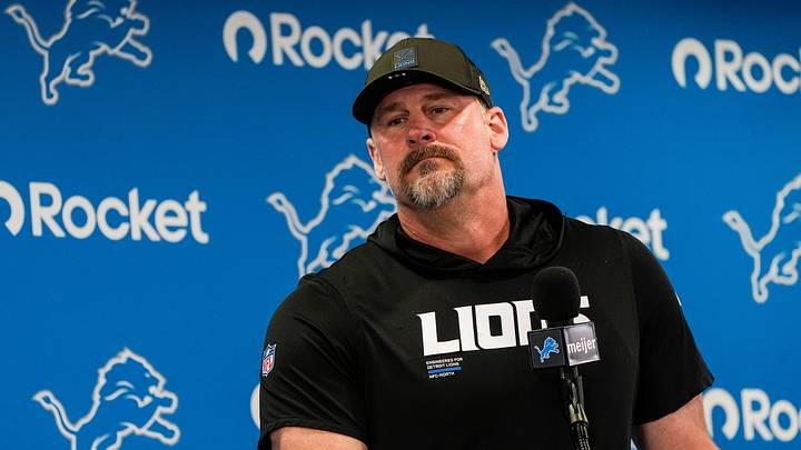 Detroit Lions head coach Dan Campbell answers a question.