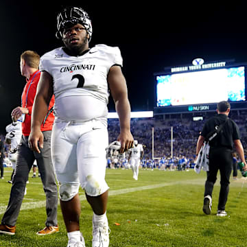 Cincinnati Bearcats defensive lineman Dontay Corleone (2) and the Cincinnati Bearcats walk off the field at the conclusion of a college football game between the Brigham Young Cougars and the Cincinnati Bearcats, Saturday, Sept. 30, 2023, at LaVell Edwards Stadium in Provo, Utah.