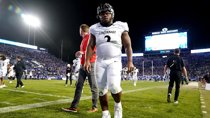 Cincinnati Bearcats defensive lineman Dontay Corleone (2) and the Cincinnati Bearcats walk off the field at the conclusion of a college football game between the Brigham Young Cougars and the Cincinnati Bearcats, Saturday, Sept. 30, 2023, at LaVell Edwards Stadium in Provo, Utah.