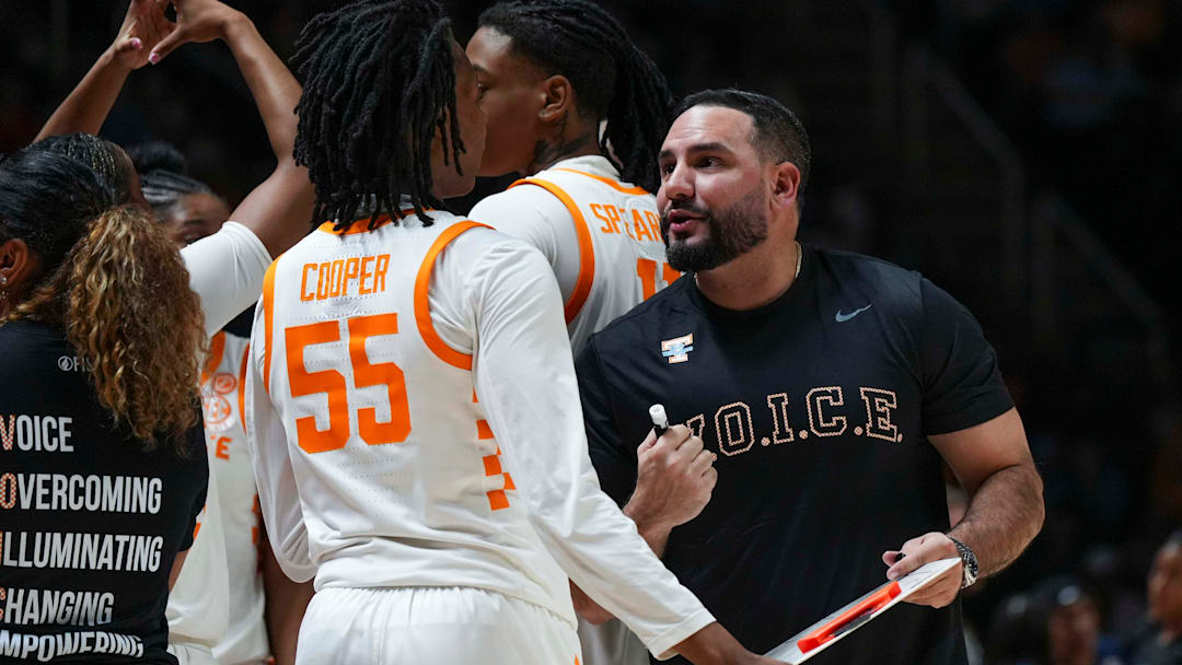 Tennessee Lady Vols assistant coach Gabe Lazo talks to Tennessee guard Talaysia Cooper (55) during a NCAA women's basketball game between the Lady Vols and Ole Miss at Thompson-Boling Arena at Food City Center in Knoxville on Sunday, February 16, 2025. Tennessee Lady Vols assistant coach Gabe Lazo talks to Tennessee guard Talaysia Cooper (55) during a NCAA women's basketball game between the Lady Vols and Ole Miss at Thompson-Boling Arena at Food City Center in Knoxville on Sunday, February 16, 2025.