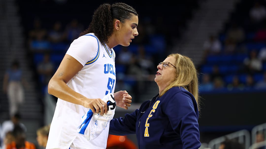 Cori Close (right) has built a roster that doesn’t have to rely solely on Lauren Betts (left).  