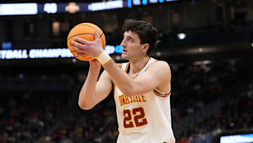 Mar 23, 2025; Milwaukee, WI, USA;  Iowa State Cyclones forward Milan Momcilovic (22) shoots against the Mississippi Rebels during the second half in the second round of the NCAA Tournament at Fiserv Forum. Mandatory Credit: Jeff Hanisch-Imagn Images