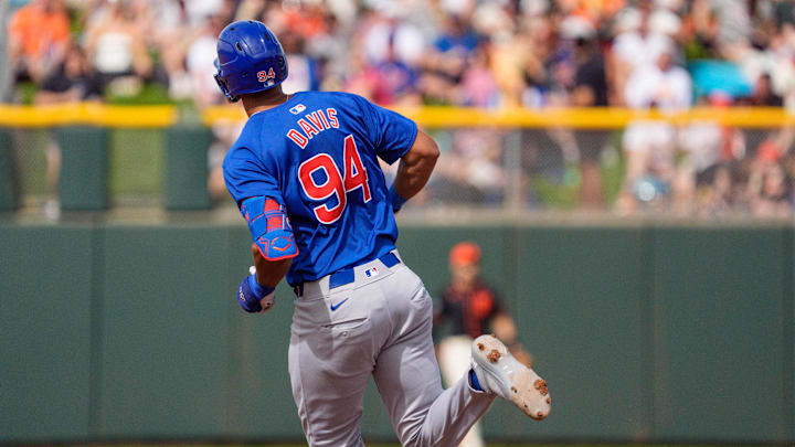 Feb 24, 2024; Scottsdale, Arizona, USA; Chicago Cubs outfielder Brennen Davis (94) rounds second base after hitting a home run in the fourth inning against the San Francisco Giants during a spring training game at Scottsdale Stadium. Mandatory Credit: Allan Henry-Imagn Images