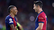 Barcelona's Raphinha (left) and Robert Lewandowski (right) are fighting for the Champions League golden boot.