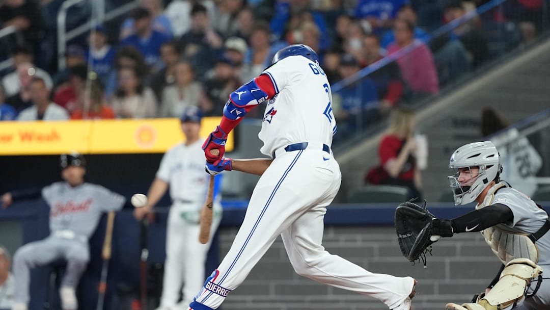 May 18, 2025; Toronto, Ontario, CAN; Toronto Blue Jays first baseman Vladimir Guerrero Jr. (27) hits a single against the Detroit Tigers during the first inning at Rogers Centre. May 18, 2025; Toronto, Ontario, CAN; Toronto Blue Jays first baseman Vladimir Guerrero Jr. (27) hits a single against the Detroit Tigers during the first inning at Rogers Centre.