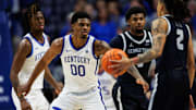 Oct 30, 2025; Lexington, KY, USA; Kentucky Wildcats guard Otega Oweh (00) defends against Georgetown Hoyas guard Malik Mack (2) during the second half at Rupp Arena at Central Bank Center. Mandatory Credit: Jordan Prather-Imagn Images