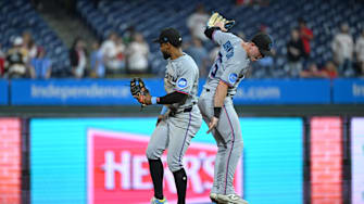 Sep 23, 2025; Philadelphia, Pennsylvania, USA; Miami Marlins second base Otto Lopez (6) and outfield Troy Johnston (75) celebrate win against the Philadelphia Phillies at Citizens Bank Park. Mandatory Credit: Eric Hartline-Imagn Images
