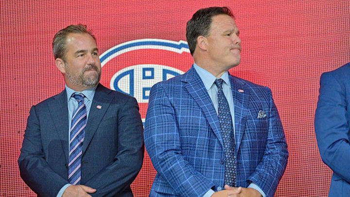 Jul 7, 2022; Montreal, Quebec, CANADA; Montreal Canadiens owner Geoff Molson (left) and executive vice president of hockey operations Jeff Gorton (right) look on before Filip Mesar (not pictured) is selected as the number twenty-six overall pick to the Montreal Canadiens in the first round of the 2022 NHL Draft at Bell Centre. Mandatory Credit: Eric Bolte-Imagn Images Jul 7, 2022; Montreal, Quebec, CANADA; Montreal Canadiens owner Geoff Molson (left) and executive vice president of hockey operations Jeff Gorton (right) look on before Filip Mesar (not pictured) is selected as the number twenty-six overall pick to the Montreal Canadiens in the first round of the 2022 NHL Draft at Bell Centre. Mandatory Credit: Eric Bolte-Imagn Images
