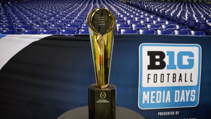 Jul 23, 2024; Indianapolis, IN, USA; The National Championship trophy is displayed during the Big 10 football media day at Lucas Oil Stadium. Mandatory Credit: Robert Goddin-USA TODAY Sports