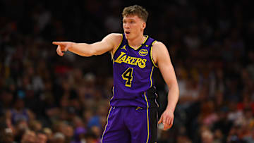 Oct 28, 2024; Phoenix, Arizona, USA; Los Angeles Lakers guard Dalton Knecht (4) against the Phoenix Suns at Footprint Center. Mandatory Credit: Mark J. Rebilas-Imagn Images