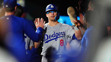 Sep 28, 2024; Denver, Colorado, USA; Los Angeles Dodgers first baseman Kike Hernandez (8) celebrates scoring a run in the ninth inning at Coors Field. Mandatory Credit: Ron Chenoy-Imagn Images