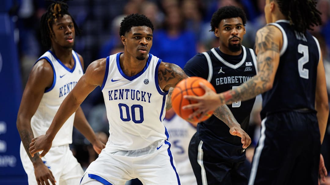 Oct 30, 2025; Lexington, KY, USA; Kentucky Wildcats guard Otega Oweh (00) defends against Georgetown Hoyas guard Malik Mack (2) during the second half at Rupp Arena at Central Bank Center. Mandatory Credit: Jordan Prather-Imagn Images Oct 30, 2025; Lexington, KY, USA; Kentucky Wildcats guard Otega Oweh (00) defends against Georgetown Hoyas guard Malik Mack (2) during the second half at Rupp Arena at Central Bank Center. Mandatory Credit: Jordan Prather-Imagn Images