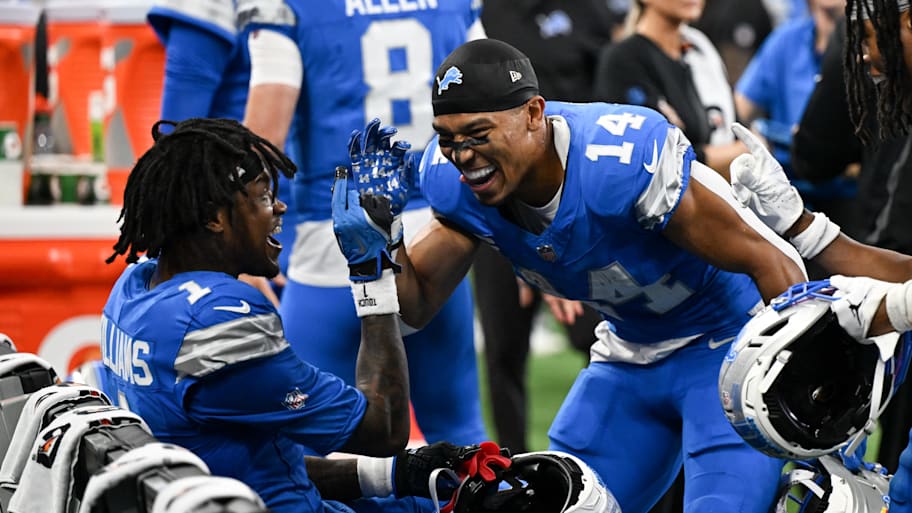 Amon-Ra St. Brown and Jameson Williams celebrate after a touchdown