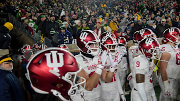 Indiana players enter the field before a game between the Indiana Hoosiers and the Notre Dame Fighting Irish in first round of the College Football Playoff on Friday, Dec. 20, 2024, in South Bend. Notre Dame defeated Indiana 27-17.