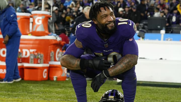 Dec 10, 2023; Baltimore, Maryland, USA;  Baltimore Ravens cornerback Arthur Maulet (10) celebrates after winning in overtime against the Los Angeles Rams at M&T Bank Stadium. Mandatory Credit: Jessica Rapfogel-USA TODAY Sports