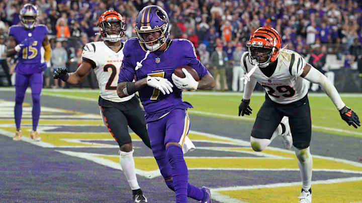 Nov 7, 2024; Baltimore, Maryland, USA; Baltimore Ravens wide receiver Rashod Bateman (7) scores a fourth quarter touchdown against the Cincinnati Bengals at M&T Bank Stadium. Mandatory Credit: Mitch Stringer-Imagn Images