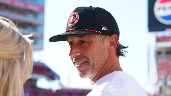 Sep 9, 2024; Santa Clara, California, USA;  San Francisco 49ers head coach Kyle Shanahan chats with a reporter before a game against the New York Jets at Levi's Stadium.