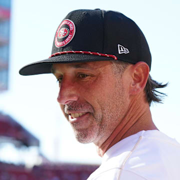 Sep 9, 2024; Santa Clara, California, USA;  San Francisco 49ers head coach Kyle Shanahan chats with a reporter before a game against the New York Jets at Levi's Stadium. Mandatory Credit: David Gonzales-Imagn Images