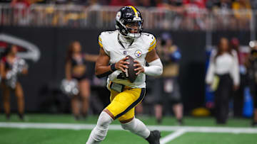 Sep 8, 2024; Atlanta, Georgia, USA; Pittsburgh Steelers quarterback Justin Fields (2) drops back to pass against the Atlanta Falcons in the fourth quarter at Mercedes-Benz Stadium. Mandatory Credit: Brett Davis-Imagn Images