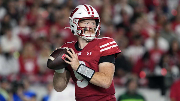 Aug 28, 2025; Madison, Wisconsin, USA; Wisconsin Badgers quarterback Billy Edwards Jr. (9) looks to throw a pass during the second quarter against the Miami (OH) RedHawks at Camp Randall Stadium. Mandatory Credit: Jeff Hanisch-Imagn Images Aug 28, 2025; Madison, Wisconsin, USA; Wisconsin Badgers quarterback Billy Edwards Jr. (9) looks to throw a pass during the second quarter against the Miami (OH) RedHawks at Camp Randall Stadium. Mandatory Credit: Jeff Hanisch-Imagn Images