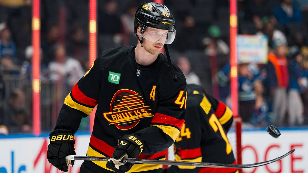 Apr 7, 2026; Vancouver, British Columbia, CAN; Vancouver Canucks forward Elias Pettersson (40) handles the puck in warm up prior to a game against the Vegas Golden Knights at Rogers Arena. Mandatory Credit: Bob Frid-Imagn Images