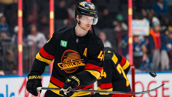 Apr 7, 2026; Vancouver, British Columbia, CAN; Vancouver Canucks forward Elias Pettersson (40) handles the puck in warm up prior to a game against the Vegas Golden Knights at Rogers Arena. Mandatory Credit: Bob Frid-Imagn Images