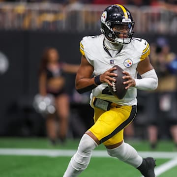 Sep 8, 2024; Atlanta, Georgia, USA; Pittsburgh Steelers quarterback Justin Fields (2) drops back to pass against the Atlanta Falcons in the fourth quarter at Mercedes-Benz Stadium. Mandatory Credit: Brett Davis-Imagn Images