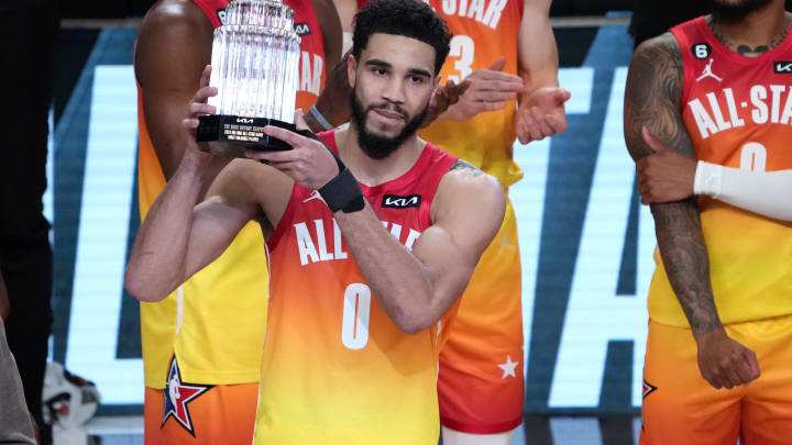 Team Giannis forward Jayson Tatum (0) holds the Kobe Bryant MVP Trophy after the 2023 NBA All-Star Game at Vivint Arena.