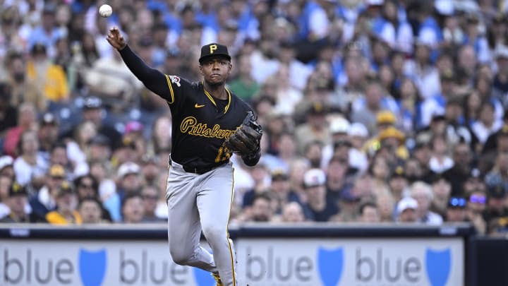 Pittsburgh Pirates third baseman Ke'Bryan Hayes (13) throws to first base during the first inning against the San Diego Padres at Petco Park. 