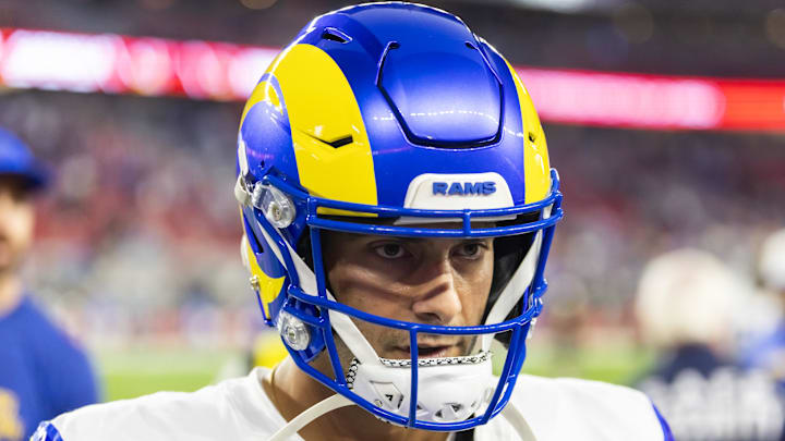 Dec 7, 2025; Glendale, Arizona, USA; Los Angeles Rams quarterback Jimmy Garoppolo (11) against the Arizona Cardinals at State Farm Stadium. Mandatory Credit: Mark J. Rebilas-Imagn Images
