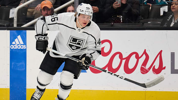 Apr 4, 2024; San Jose, California, USA; Los Angeles Kings center Blake Lizotte (46) plays the puck against the San Jose Sharks during the first period at SAP Center at San Jose. Mandatory Credit: Robert Edwards-Imagn Images