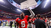 Nov 28, 2025; Atlanta, Georgia, USA; Georgia Bulldogs defensive back Daylen Everette (6) celebrates after a victory over the Georgia Tech Yellow Jackets at Mercedes-Benz Stadium. Mandatory Credit: Brett Davis-Imagn Images
