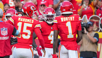 Sep 15, 2024; Kansas City, Missouri, USA; Kansas City Chiefs wide receiver Rashee Rice (4) celebrates after scoring against the Cincinnati Bengals during the game at GEHA Field at Arrowhead Stadium. Mandatory Credit: Denny Medley-Imagn Images