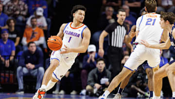 Dec 21, 2024; Gainesville, Florida, USA; Florida Gators guard Walter Clayton Jr. (1) dribbles the ball against the North Florida Ospreys during the first half at Exactech Arena at the Stephen C. O'Connell Center. Mandatory Credit: Matt Pendleton-Imagn Images