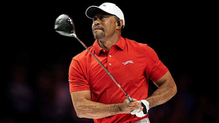 Tiger Woods of Jupiter Links GC tees off during a TGL match against Atlanta Drive GC at SoFi Center. Tiger Woods of Jupiter Links GC tees off during a TGL match against Atlanta Drive GC at SoFi Center.