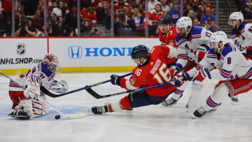 May 28, 2024; Sunrise, Florida, USA; Florida Panthers center Aleksander Barkov (16) shoots the puck against New York Rangers goaltender Igor Shesterkin (31) during overtime in game four of the Eastern Conference Final of the 2024 Stanley Cup Playoffs at Amerant Bank Arena. Mandatory Credit: Sam Navarro-USA TODAY Sports