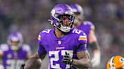 Dec 29, 2024; Minneapolis, Minnesota, USA; Minnesota Vikings running back Cam Akers (27) runs with the ball against Green Bay Packers in the second quarter at U.S. Bank Stadium. Mandatory Credit: Brad Rempel-Imagn Images