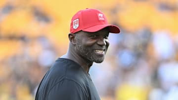 Aug 16, 2025; Pittsburgh, Pennsylvania, USA; TTampa Bay Buccaneers head coach Todd Bowles () warms up for a game against the Pittsburgh Steelers at Acrisure Stadium. Mandatory Credit: Barry Reeger-Imagn Images