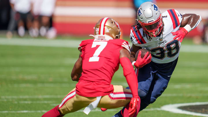 Sep 29, 2024; Santa Clara, California, USA; New England Patriots running back Rhamondre Stevenson (38) is tackled by San Francisco 49ers cornerback Charvarius Ward (7) during the first quarter at Levi's Stadium. Mandatory Credit: Neville E. Guard-Imagn Images Sep 29, 2024; Santa Clara, California, USA; New England Patriots running back Rhamondre Stevenson (38) is tackled by San Francisco 49ers cornerback Charvarius Ward (7) during the first quarter at Levi's Stadium. Mandatory Credit: Neville E. Guard-Imagn Images