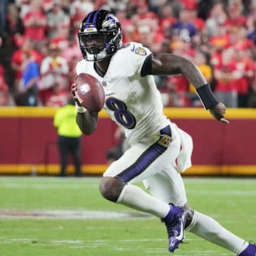 Sep 5, 2024; Kansas City, Missouri, USA; Baltimore Ravens quarterback Lamar Jackson (8) runs the ball against the Kansas City Chiefs during the second half at GEHA Field at Arrowhead Stadium. Mandatory Credit: Denny Medley-Imagn Images