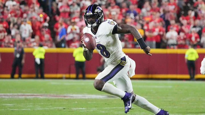 Sep 5, 2024; Kansas City, Missouri, USA; Baltimore Ravens quarterback Lamar Jackson (8) runs the ball against the Kansas City Chiefs during the second half at GEHA Field at Arrowhead Stadium. Mandatory Credit: Denny Medley-Imagn Images