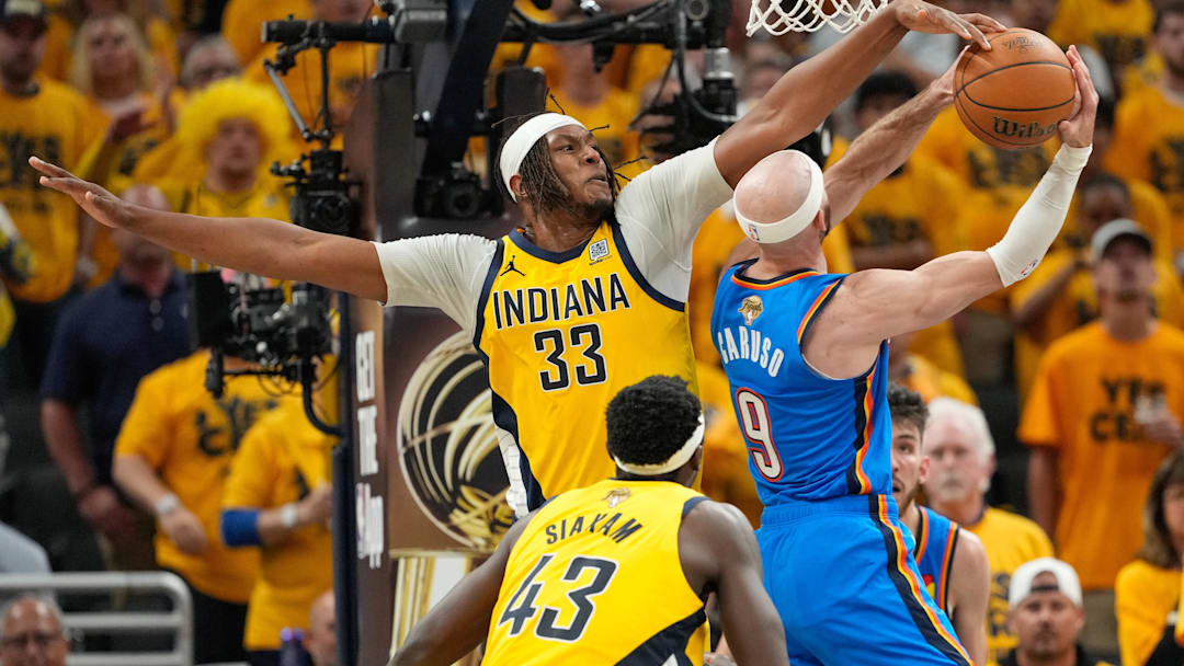 Jun 19, 2025; Indianapolis, Indiana, USA; Indiana Pacers center Myles Turner (33) blocks a shot by Oklahoma City Thunder guard Alex Caruso (9) in the third quarter during game six of the 2025 NBA Finals at Gainbridge Fieldhouse. Mandatory Credit: Kyle Terada-Imagn Images Jun 19, 2025; Indianapolis, Indiana, USA; Indiana Pacers center Myles Turner (33) blocks a shot by Oklahoma City Thunder guard Alex Caruso (9) in the third quarter during game six of the 2025 NBA Finals at Gainbridge Fieldhouse. Mandatory Credit: Kyle Terada-Imagn Images