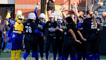 The Oklahoma City Spark's Jocelyn Alo is greeted at home by teammates after celebrates a home run during a softball against the Florida Vibe at Oklahoma Christian University in Edmond, Okla., Tuesday, July 22, 2025.