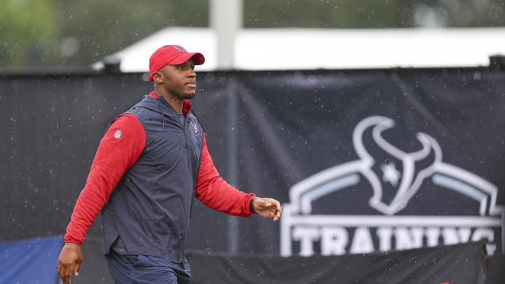 Jul 27, 2024; Houston, TX, USA; Houston Texans head coach DeMeco Ryans walks on the field before training camp at Houston Methodist Training Center. Mandatory Credit: Troy Taormina-USA TODAY Sports