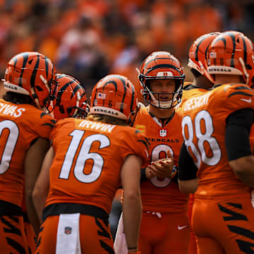 Sep 8, 2024; Cincinnati, Ohio, USA; Cincinnati Bengals quarterback Joe Burrow (9) huddles his team in the second half against the New England Patriots at Paycor Stadium. Mandatory Credit: Katie Stratman-Imagn Images