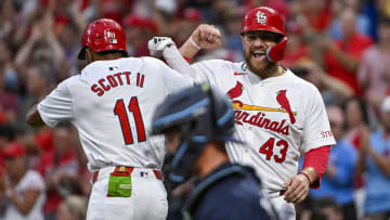 Aug 6, 2024; St. Louis, Missouri, USA;  St. Louis Cardinals center fielder Victor Scott II (11) celebrates with catcher Pedro Pages (43) after hitting a two run home run against the Tampa Bay Rays during the second inning at Busch Stadium. Mandatory Credit: Jeff Curry-USA TODAY Sports