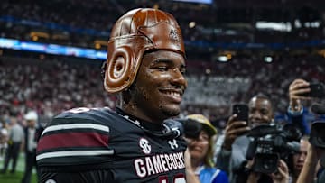 Aug 31, 2025; Atlanta, Georgia, USA; South Carolina Gamecocks quarterback LaNorris Sellers (16) wears the Old Leather Helmet after defeating the Virginia Tech Hokies at Mercedes-Benz Stadium. Mandatory Credit: Dale Zanine-Imagn Images