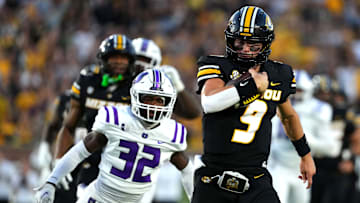 Missouri Tigers quarterback Beau Pribula (9) rushes for a big gain, in a game versus the Central Arkansas Bears this season.